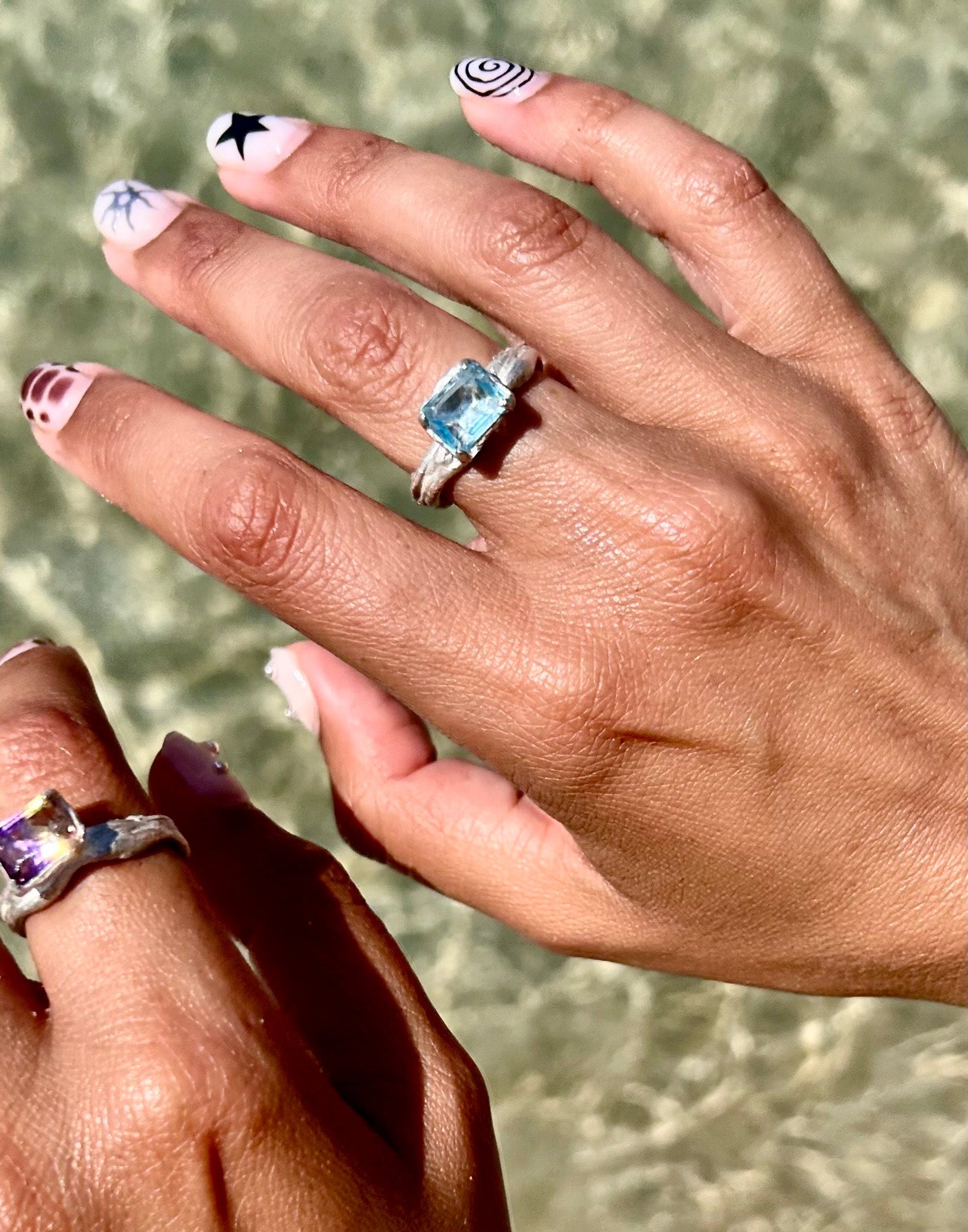 The Altar rings with ametrine or blue topaz